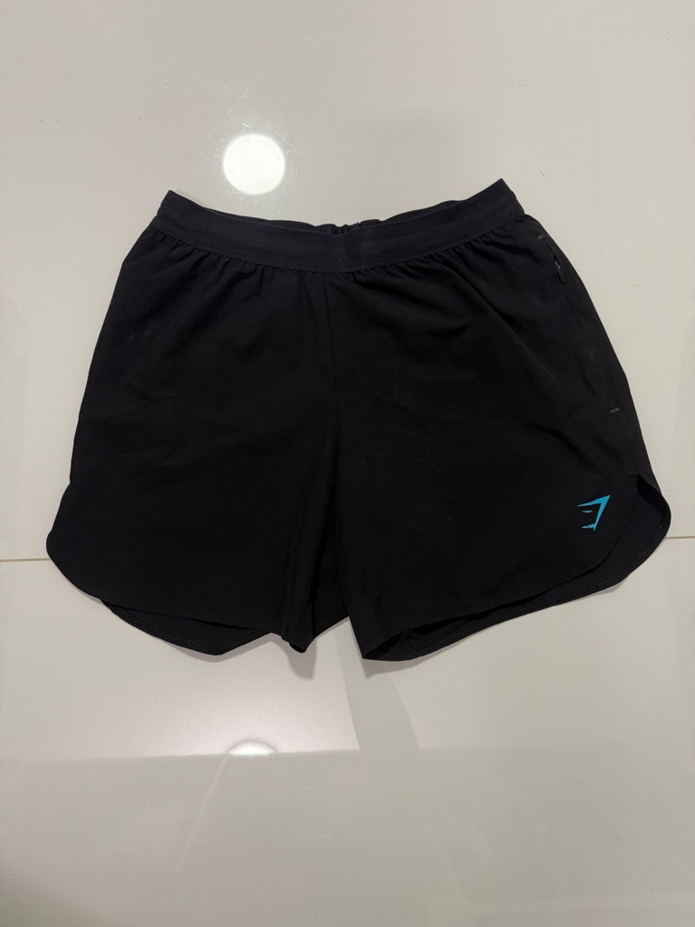 Gymshark Men's Black Athletic Shorts with Blue Logo